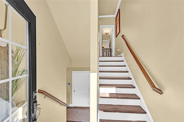 stairs featuring baseboards