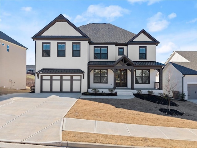 6035 Morning Star Ln, Gainesville, GA 30506 - modern farmhouse style home featuring a standing seam roof, stucco siding, metal roof, a garage, and driveway