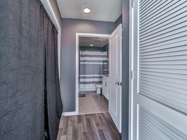 361 17th St NW Unit 1121, Atlanta, GA 30363 - hallway featuring wood-type flooring