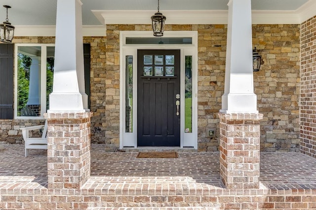 3441 Shoreland Dr, Buford, GA 30518 - property entrance featuring covered porch and brick siding