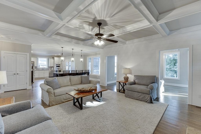 3441 Shoreland Dr, Buford, GA 30518 - living area with coffered ceiling, ceiling fan, wood finished floors, beam ceiling, and baseboards