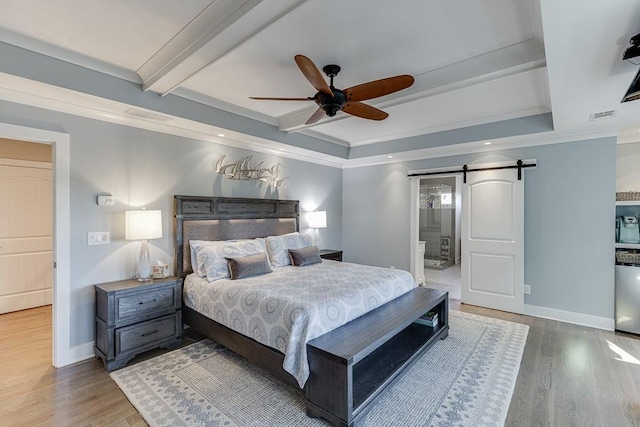 3441 Shoreland Dr, Buford, GA 30518 - bedroom featuring a barn door, crown molding, wood finished floors, baseboards, and beam ceiling