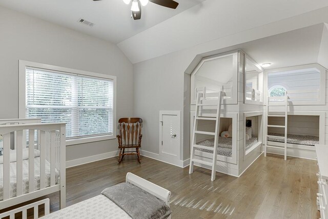 3441 Shoreland Dr, Buford, GA 30518 - bedroom featuring lofted ceiling, wood finished floors, baseboards, and ceiling fan