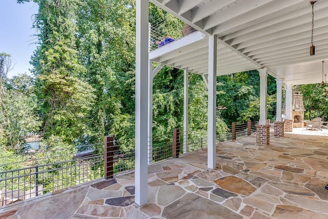 3441 Shoreland Dr, Buford, GA 30518 - view of patio / terrace featuring a fireplace