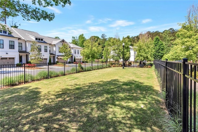 view of yard with a garage