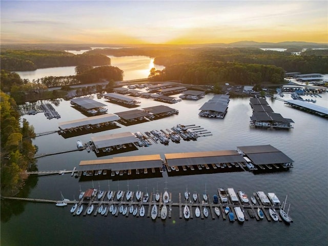 aerial view at dusk with a water view