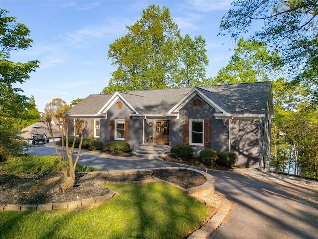 single story home featuring brick siding and french doors
