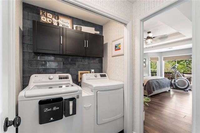 kitchen with crown molding, white cabinets, a notable chandelier, appliances with stainless steel finishes, and a sink