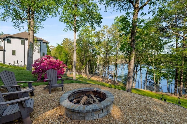 rear view of house with a deck and fence