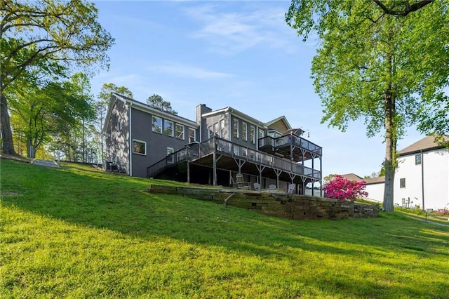 surrounding community with a water view, aphalt driveway, and a dock