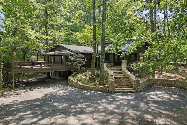 view of front of house featuring a wooden deck