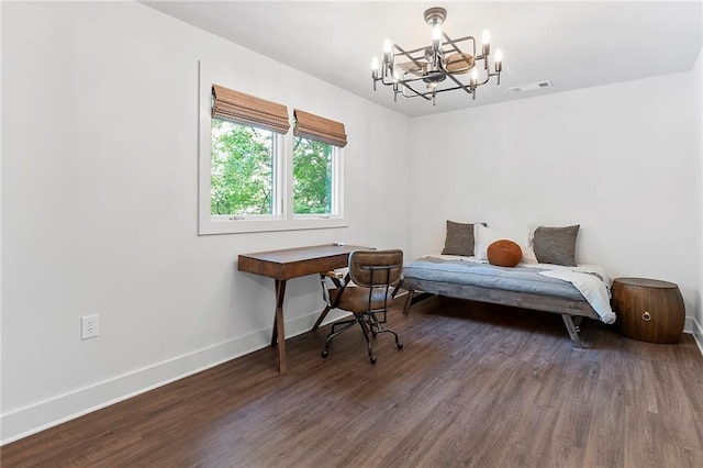 interior space featuring an inviting chandelier and dark wood-type flooring