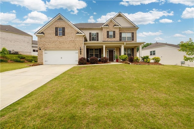 craftsman inspired home with brick siding, concrete driveway, a garage, and a front lawn
