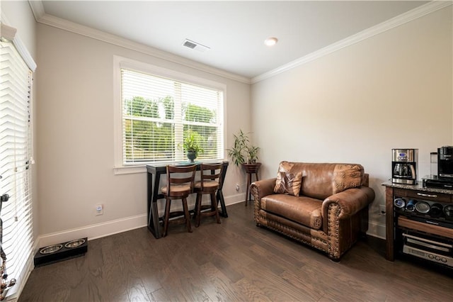 office space with dark wood finished floors, ornamental molding, and baseboards
