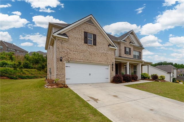 traditional-style home with brick siding, driveway, and a front yard