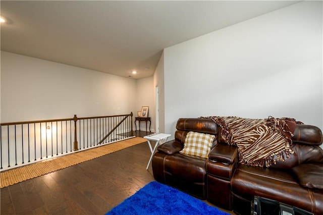 living room with wood finished floors and recessed lighting