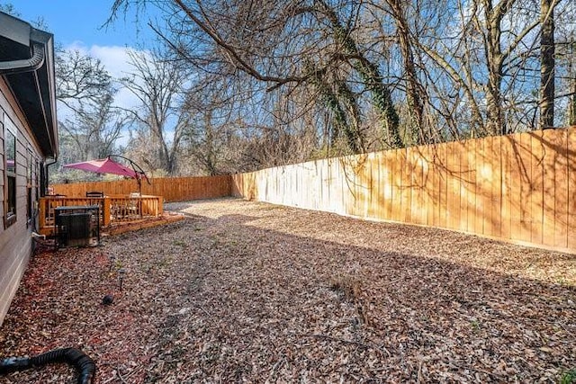 view of yard featuring a fenced backyard