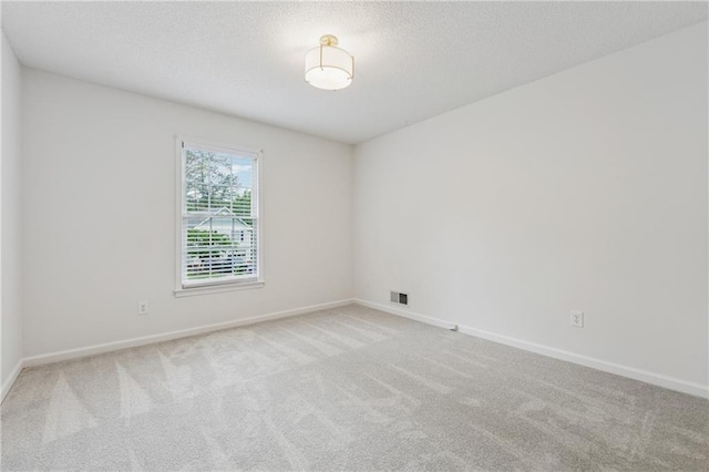 2986 Edenberry Ln NW, Kennesaw, GA 30152 - carpeted empty room featuring baseboards and a textured ceiling