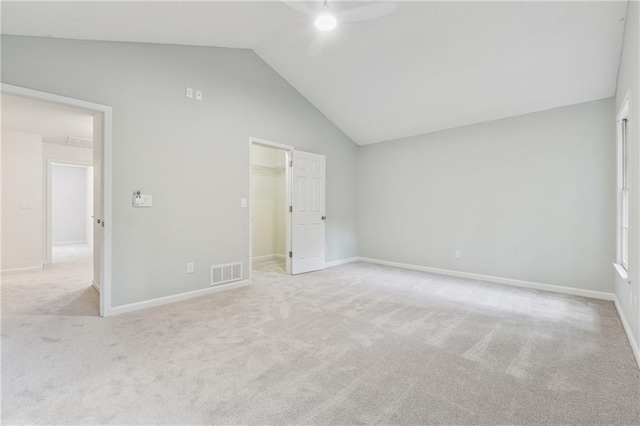 2986 Edenberry Ln NW, Kennesaw, GA 30152 - unfurnished bedroom with lofted ceiling, carpet, a walk in closet, baseboards, and a ceiling fan