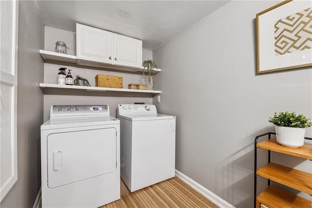 2986 Edenberry Ln NW, Kennesaw, GA 30152 - laundry area featuring cabinet space, independent washer and dryer, and baseboards