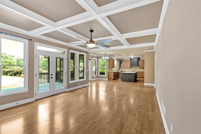 17 River Walk Pkwy, Euharlee, GA 30145 - unfurnished living room with coffered ceiling, baseboards, light wood-style flooring, french doors, and ceiling fan