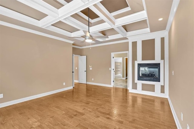 17 River Walk Pkwy, Euharlee, GA 30145 - unfurnished living room with coffered ceiling, beam ceiling, a ceiling fan, light wood-style flooring, and baseboards