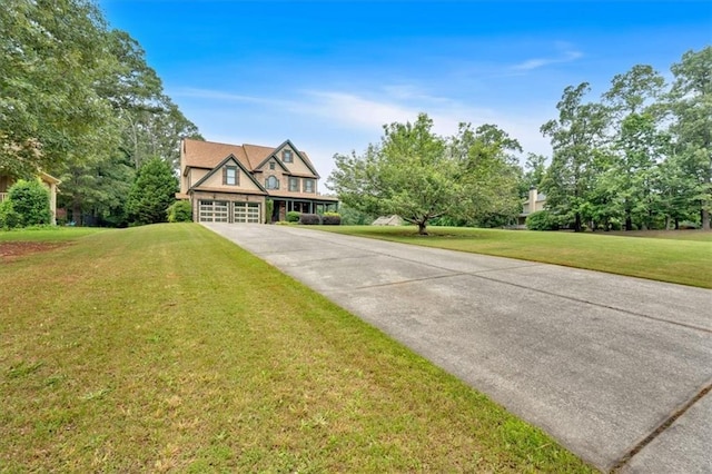 17 River Walk Pkwy, Euharlee, GA 30145 - view of front of house with driveway, a front yard, and a garage