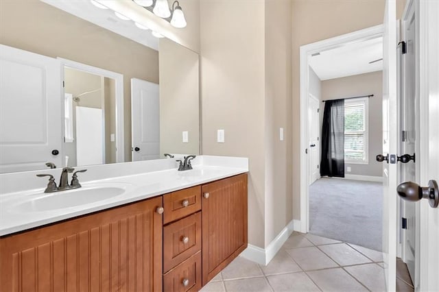 17 River Walk Pkwy, Euharlee, GA 30145 - bathroom with double vanity, baseboards, and tile patterned flooring