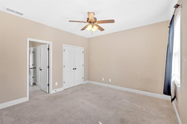 17 River Walk Pkwy, Euharlee, GA 30145 - unfurnished bedroom featuring carpet, baseboards, ensuite bathroom, and a ceiling fan
