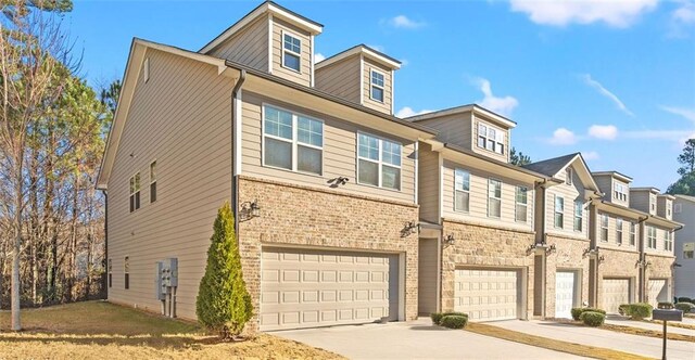 view of property featuring a garage