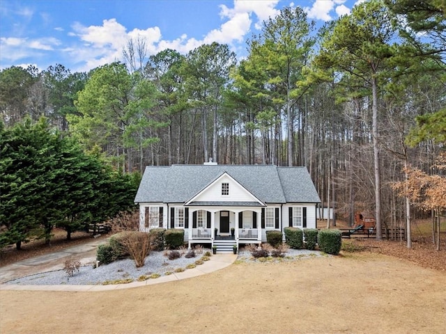 view of front of home featuring covered porch