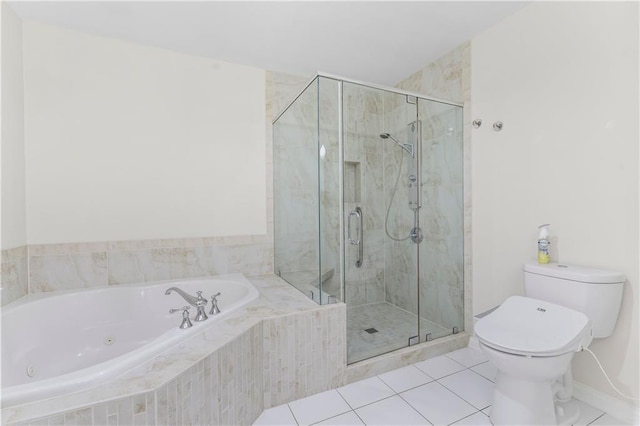 bathroom featuring toilet, independent shower and bath, and tile patterned flooring