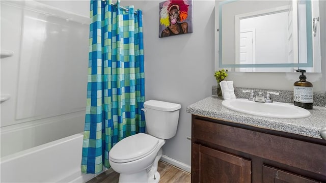 full bathroom featuring shower / tub combo with curtain, vanity, toilet, and wood-type flooring