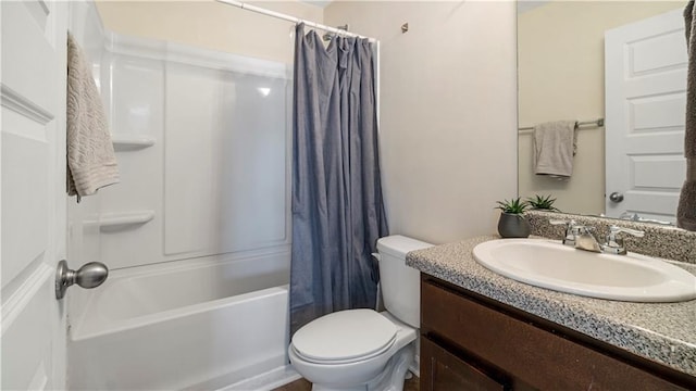 full bathroom with vanity, toilet, and shower / bath combo with shower curtain