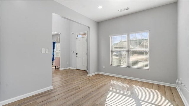 entrance foyer featuring light wood-type flooring