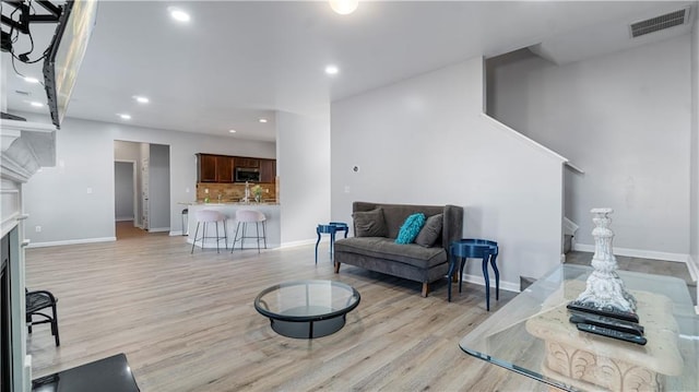 living room with light wood-type flooring