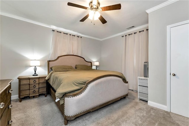 carpeted bedroom with a ceiling fan, baseboards, visible vents, and ornamental molding