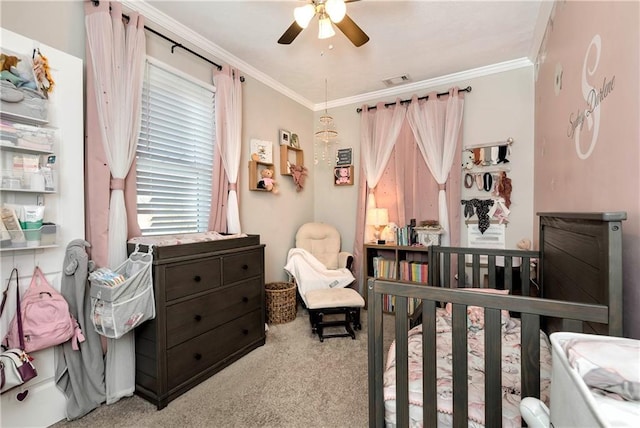 carpeted bedroom featuring visible vents, a ceiling fan, and ornamental molding