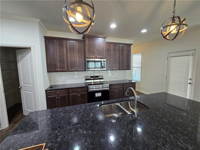 5521 Shallow Branch Dr, Flowery Branch, GA 30542 - kitchen featuring stainless steel appliances, a sink, crown molding, a chandelier, and decorative backsplash