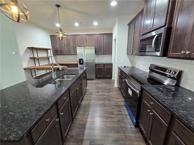 5521 Shallow Branch Dr, Flowery Branch, GA 30542 - kitchen featuring stainless steel appliances, a sink, dark wood finished floors, dark brown cabinetry, and ornamental molding