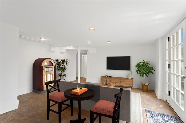 tiled living area with recessed lighting