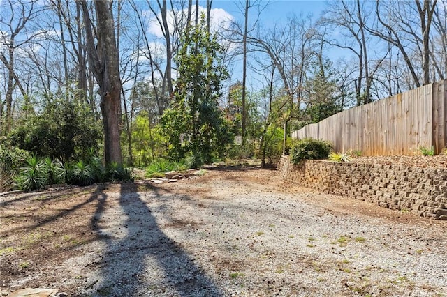 view of yard with fence