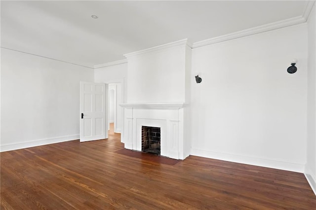 unfurnished living room with a fireplace with flush hearth, wood finished floors, baseboards, and ornamental molding