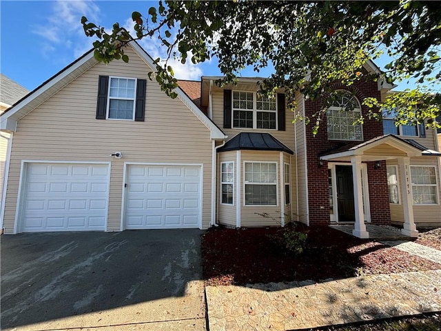 front of property featuring a garage