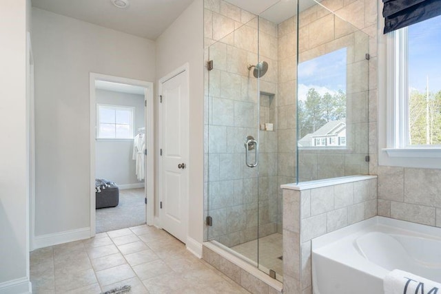 5315 Trescott Path, Cumming, GA 30028 - full bath featuring a shower stall, healthy amount of natural light, a garden tub, and baseboards