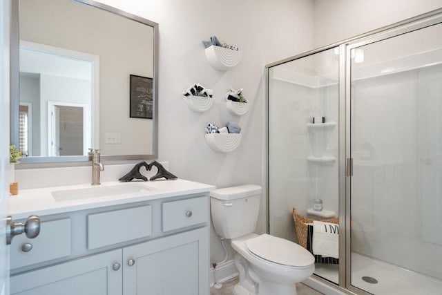 5315 Trescott Path, Cumming, GA 30028 - bathroom featuring a shower stall, vanity, and toilet