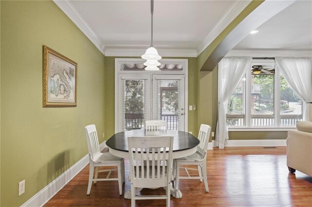 1605 Pavillion Ridge Dr SE, Smyrna, GA 30080 - dining room featuring crown molding, wood finished floors, and ceiling fan