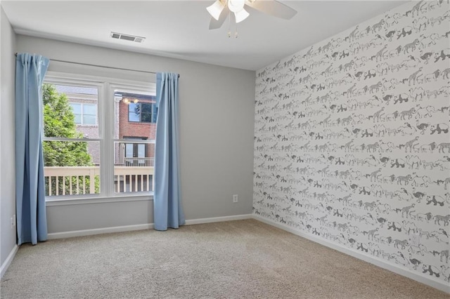 1605 Pavillion Ridge Dr SE, Smyrna, GA 30080 - carpeted empty room featuring wallpapered walls and a ceiling fan