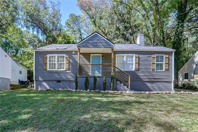 view of front of home with a front yard