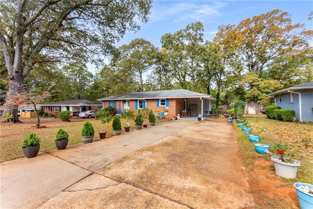 view of front of home featuring a carport